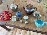 All nine items displayed on wooden table