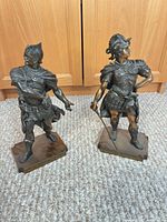 Both Roman soldier figurines standing on bases