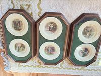 Three octagonal frames each with two plates