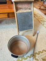 Full view of washboard, pot and baton