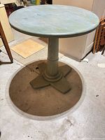 Full view of round pedestal table