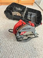 Circular saw with case halves visible