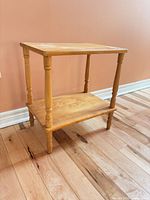 Full view of pine two-tier table, front angle