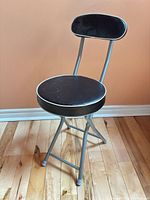 Front view of folding stool set up