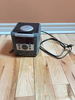 Front and side view of Venturer CD1162 with AC cord