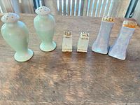 All three pairs upright on table surface