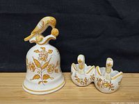 Front view of bell and double swan dish showing design and coloration