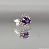 Front view showing amethyst and surrounding clear stones