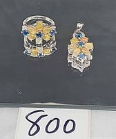 Ring and pendant side by side showing overall design and scale