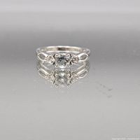 Full view of sterling silver three-stone ring