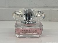 Front view of Versace Bright Crystal bottle showing logo and fill level