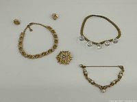 Overview of all six jewelry pieces