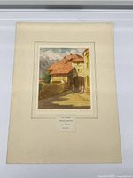 Full view of matted aquatint print on surface