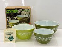 All three bowls, box, leaflet displayed