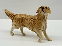 Full side view of Royal Doulton golden retriever figurine
