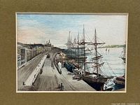 Close view of the coloured etching showing ships, quay, signature and mat