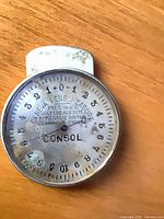 Front view of Consol Geneva lens measure showing dial, pointer, patent text