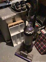 Full view of Dyson upright ball vacuum with floor head attached