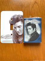 Switch plate and sealed playing cards side by side