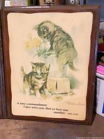 Front of plaque with kittens and John 13:34 verse