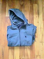 Hoodie folded showing hood and zipper