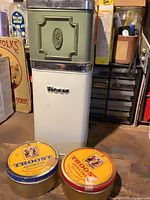 Group shot of all four tins