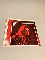 Front view of folded poster showing panel PI portrait