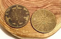 Front view showing Scout Oath coin and Scout Law coin on wood surface