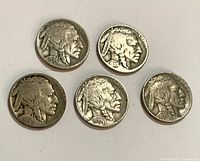 Obverse of five Buffalo nickels