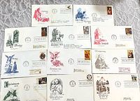 Front view of eleven Christmas nativity first day covers