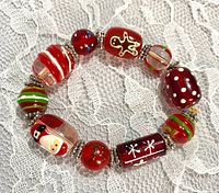 Bracelet laid flat showing bead designs and spacers