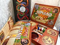 Open Jumanji board showing main board artwork, rulebook, components