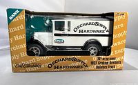Front and side view of diecast truck inside original Orchard Supply Hardware box