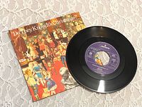 Front of picture sleeve and vinyl record