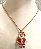 Full view of Santa pendant necklace on display bust