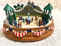 Front angled view of miniature roller coaster music box
