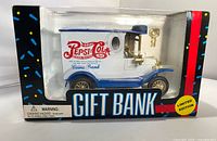 Front view of boxed die-cast Pepsi-Cola delivery truck coin bank