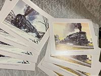 Stacked view of both print designs showing cardstock border and captions