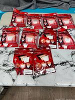 Ten sealed packs laid out