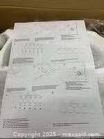 Instruction sheet and packaged components inside box