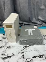 Sample assembled organizer and sealed stack of organizers