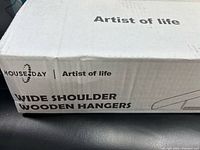 Factory box showing HOUSE DAY branding and product name