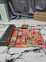 Incense holder assembled and seven boxed incense laid out