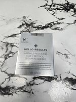 Front of sealed IT Cosmetics Hello Results serum box showing product name and size 1.7 US fl oz ⁄ 50 ml