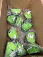 Top view of box showing multiple green appetizer bowl packages