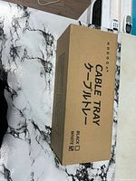 Retail box showing brand NODOCA and product label Cable Tray