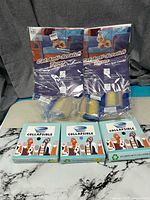 Two packs cat anti-scratch tapes, two yellow rollers, three collapsible bowl boxes