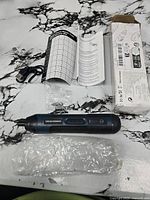 Electric screwdriver, bits pack, manual, cable, box