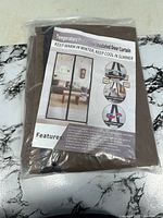 Front view of sealed package showing product label and color