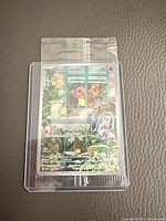 Front view of sealed Charmander promo card in sleeve and toploader
